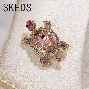 SKEDS-broches brillantes con diamantes de imitación de tortuga para hombre y mujer, insignias de serie de animales de alta calidad, regalo de joyería