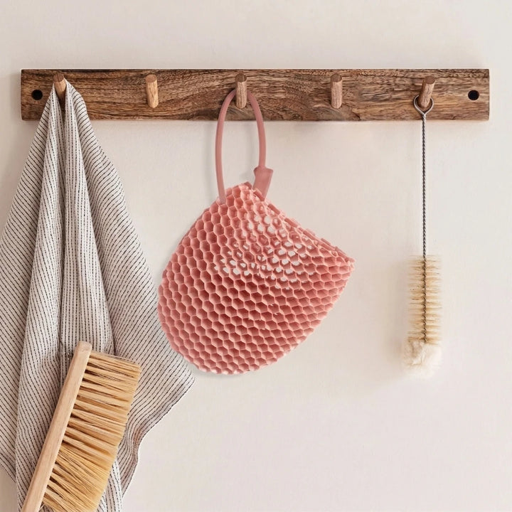 Honeycomb Exfoliating Shower Finger Caps, available in multiple colors, cleanses the skin and is safe, breathable and odorless.